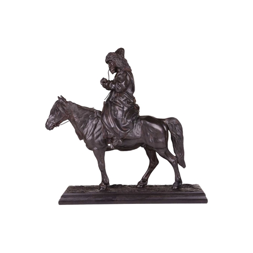 92 - Artemy Ober (1843-1917) Russian, a cast and patinated iron figure of a mounted Kyrgyz smoking a pipe... 