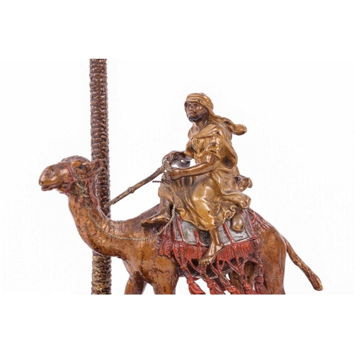 95 - Franz Bergman: an Austrian cold-painted bronze figural inkstand, modelled as a bedouin tribesman ato... 