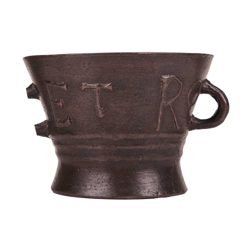 97 - A late Elizabethan heavy bronze leaded mortar, of waisted form, 14 cm high x 19 cm diameter.