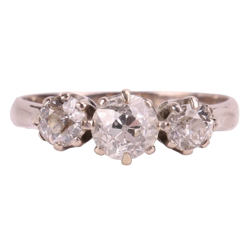 2 - An old-cut diamond trilogy ring in 18ct white gold, with an estimated total diamond weight of 1.41ct... 