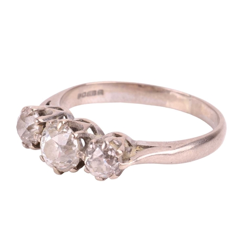 2 - An old-cut diamond trilogy ring in 18ct white gold, with an estimated total diamond weight of 1.41ct... 