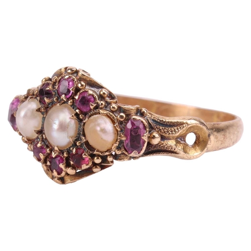 22 - A Victorian seed pearl and ruby ring, of cluster design, centred with three seed pearls, encircled b... 