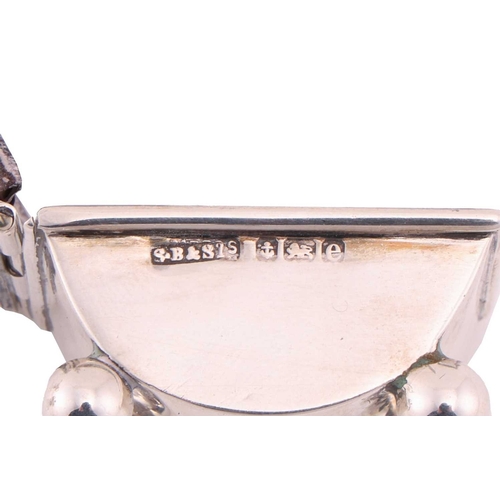 354 - A late Victorian silver novelty inkwell in the form of a pen nib with pen rest and drop-in clear gla... 