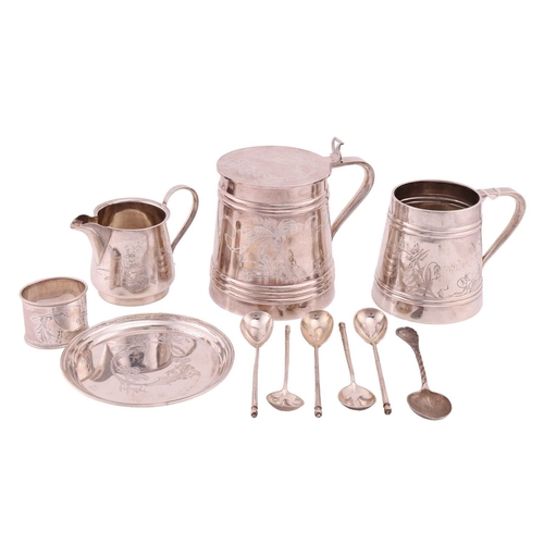 355 - A collection of Russian white metal items; to include a tankard with cover, reeded bands on tapered ... 