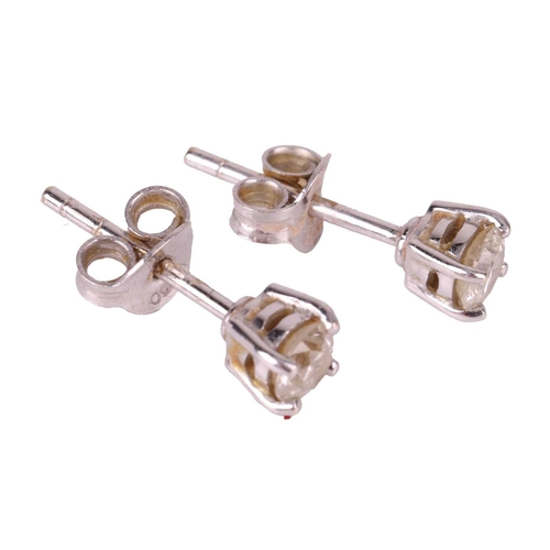 61 - A pair of diamond stud earrings in 18ct white gold, each consisting of a 3.7 mm round brilliant-cut ... 