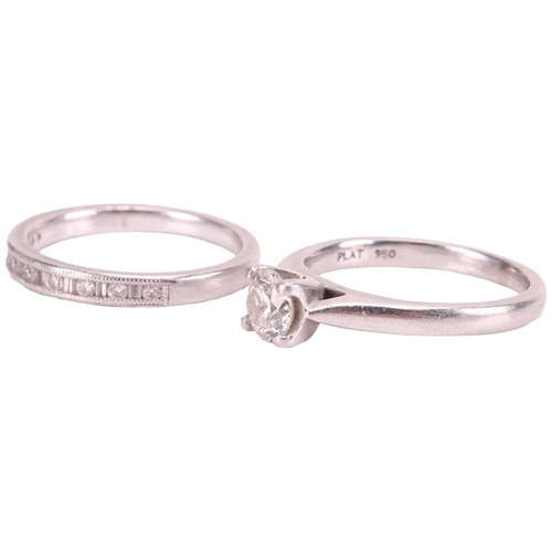 67 - A set of platinum and diamond rings; the solitaire featuring a single round brilliant-cut diamond of... 