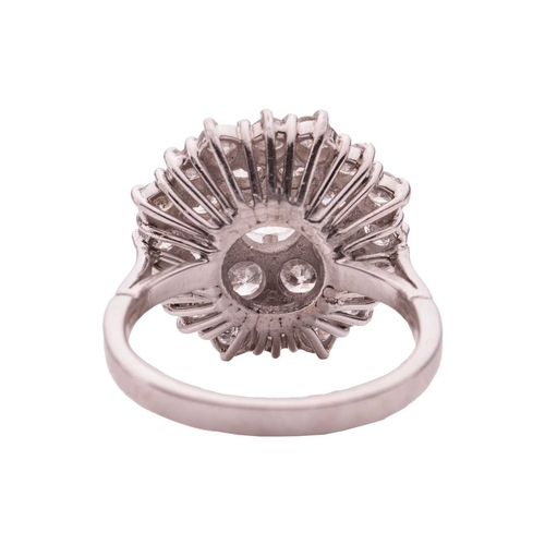 77 - A diamond-set cluster ring, set with twenty-five brilliant-cut diamonds with an estimated total cara... 