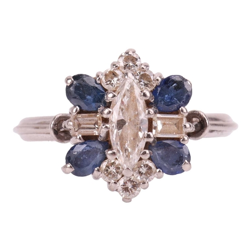 8 - A diamond and sapphire cluster ring, with an estimated diamond carat weight of 0.70ct, comprising a ... 