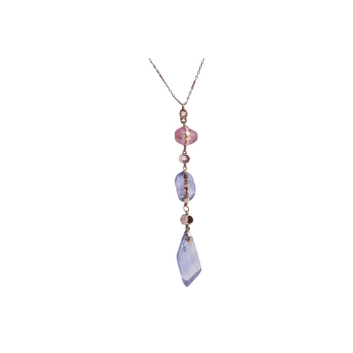 89 - A sapphire and diamond lavaliere necklace, the pendant comprising a tumbled pink sapphire and two sa... 