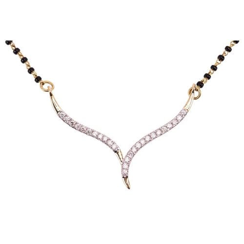 9 - A diamond-set chevron necklace, the stylised pendant set with brilliant-cut diamonds, attached to a ... 