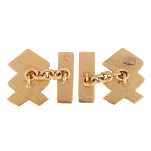 91 - A pair of geometric cufflinks, resembling the logo of Standard Chartered, chain connected to bar bac... 