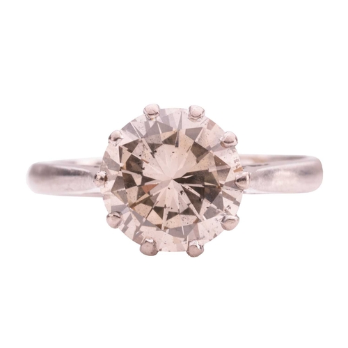 106 - A solitaire diamond ring, comprising a central claw-set round brilliant-cut diamond of estimated 2.0... 