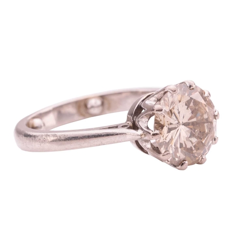 106 - A solitaire diamond ring, comprising a central claw-set round brilliant-cut diamond of estimated 2.0... 