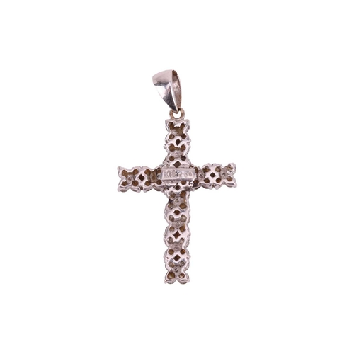 80 - A diamond two-row crucifix pendant, featuring forty-two small round brilliant-cut diamonds with an a... 