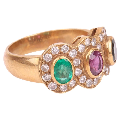 A multi-gem triple cluster ring, bezel-set with an oval-cut sapphire ...