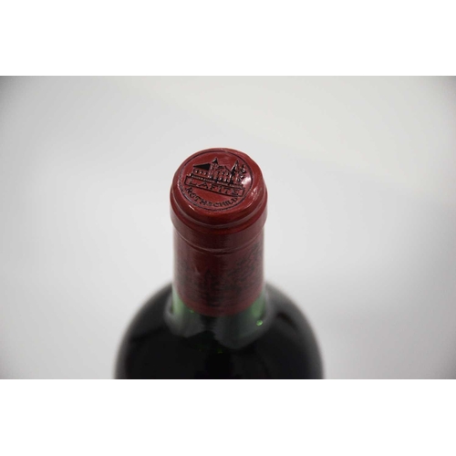 191 - A bottle of 1982 Chateau Lafite Rothschild Pauillac, 75cl. Local private collection. Level to top of... 