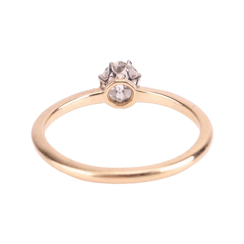 13 - A diamond solitaire ring, featuring a central claw-set old-cut diamond of estimated 0.48ct, to a tap... 