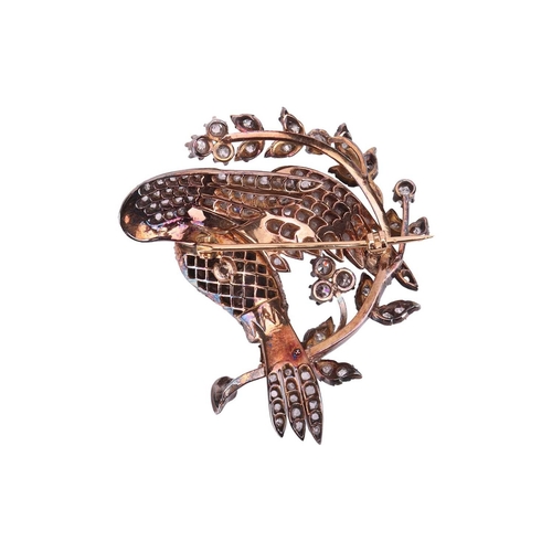 18 - A 19th-century diamond-set bird brooch, composed of a bird with spread wings, the body, wings and ta... 