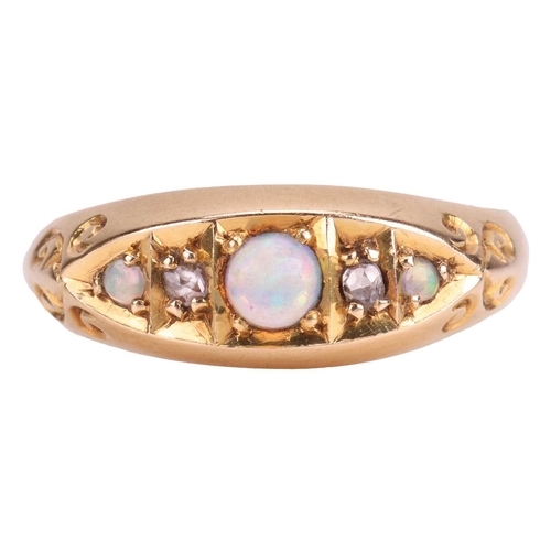 26 - An Edwardian opal and diamond-set half hoop ring, featuring a central opal cabochon, flanked by two ... 