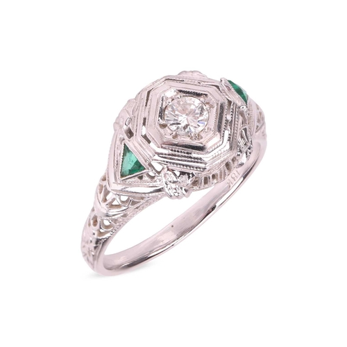 42 - An Art Deco-style ring, centrally-set with a round brilliant-cut diamond in a geometric setting with... 