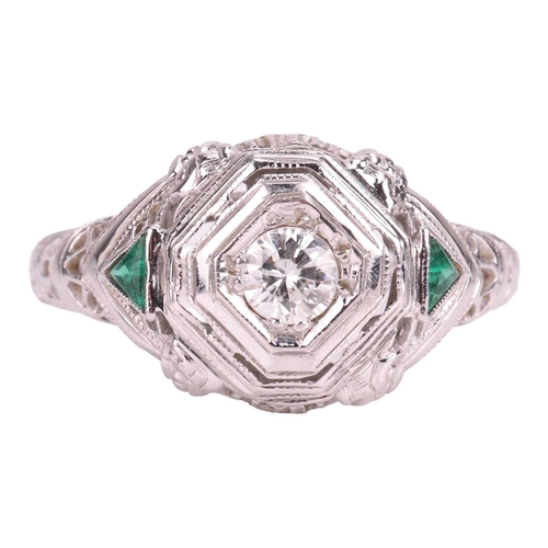 42 - An Art Deco-style ring, centrally-set with a round brilliant-cut diamond in a geometric setting with... 