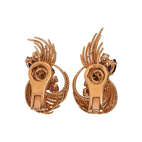 50 - Kutchinsky - A pair of gem-set clip-on earrings in 18ct yellow gold, the stylised sprays of swirl fo... 