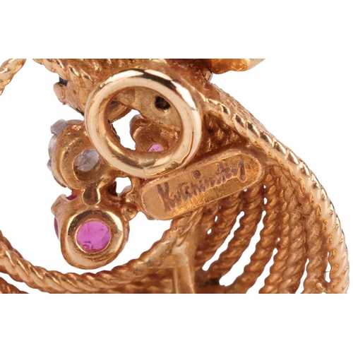 50 - Kutchinsky - A pair of gem-set clip-on earrings in 18ct yellow gold, the stylised sprays of swirl fo... 