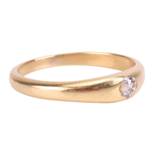 9 - A diamond-set gypsy ring, featuring a flush-set old-cut diamond of estimated 0.20ct, to a tapering y... 