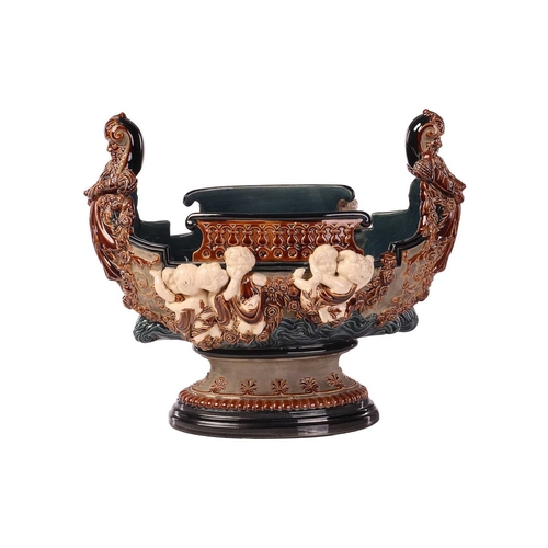 175 - A large Gerbing & Stephan majolica jardinière, late 19th century, modelled as a Viking longship on ... 