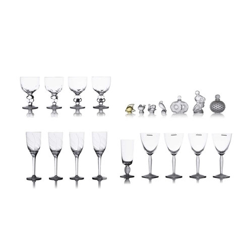 185 - Lalique: a collection of assorted contemporary crystal items, comprising: a set of four 'Louvre' win... 