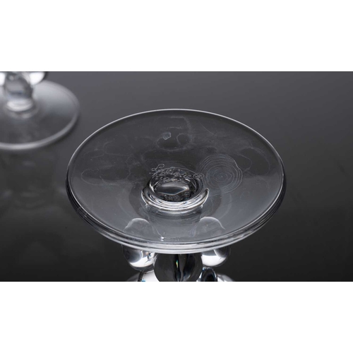 185 - Lalique: a collection of assorted contemporary crystal items, comprising: a set of four 'Louvre' win... 