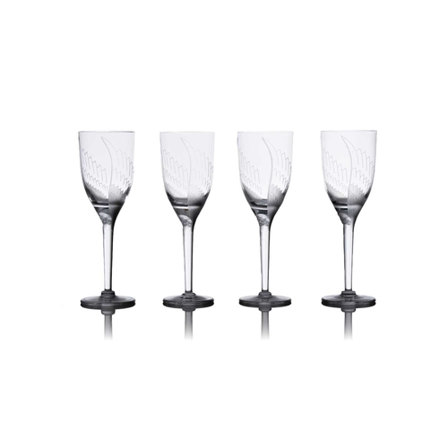 185 - Lalique: a collection of assorted contemporary crystal items, comprising: a set of four 'Louvre' win... 