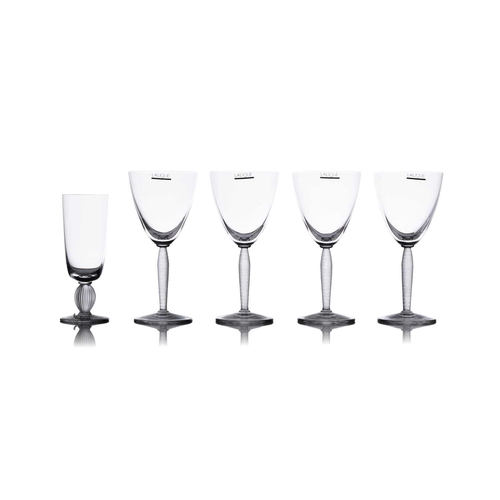 185 - Lalique: a collection of assorted contemporary crystal items, comprising: a set of four 'Louvre' win... 