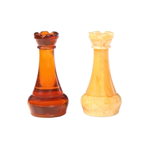 187 - A simulated amber chess set, late 20th century, the figures contained in a hardwood case with presse... 