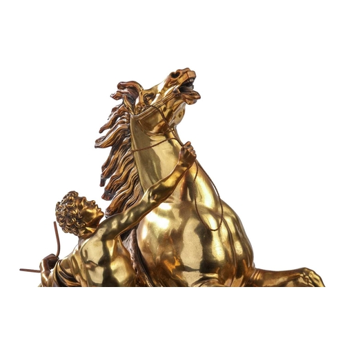 197 - After Cousteau, a gilt bronze figure of the Marley horse and handler, late 19th/early 20th century, ... 