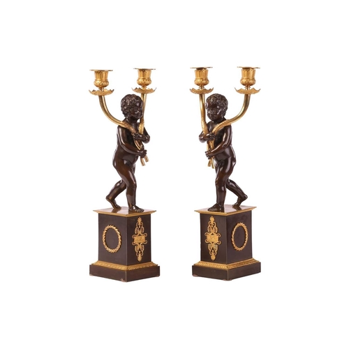 198 - A fine pair of French Empire-style bronze and ormolu twin-sconce candlesticks, after Claude Galle, m... 