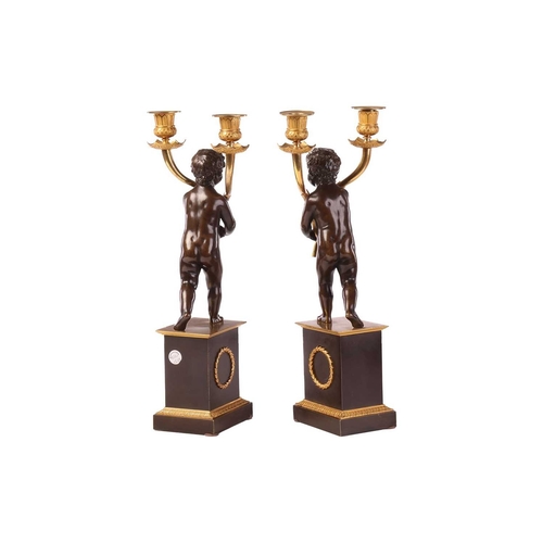 198 - A fine pair of French Empire-style bronze and ormolu twin-sconce candlesticks, after Claude Galle, m... 