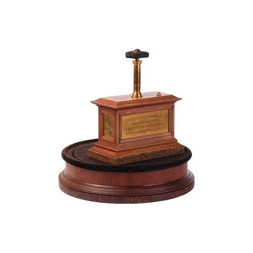 200 - A 19th-century display stand and dome, with internal display plinth, bearing a plaque with Latin tex... 