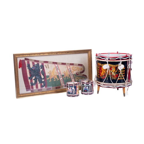 208 - A 19th-century needlework military flag, Welsh Guards, of shaped outline, with a Lion Gardant and tw... 