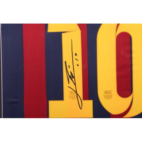 221 - Lionel Messi, a signed Barcelona framed football shirt, the autograph in black marker to the rear nu... 