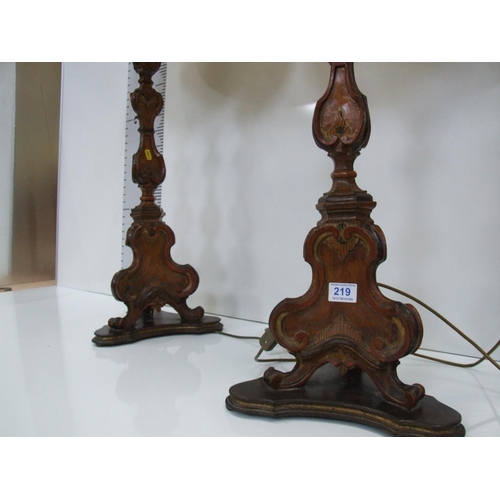 219 - Pair carved wooden table/floor lamps and shades