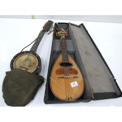 35 - Old banjo & mandolin in a cases A/F