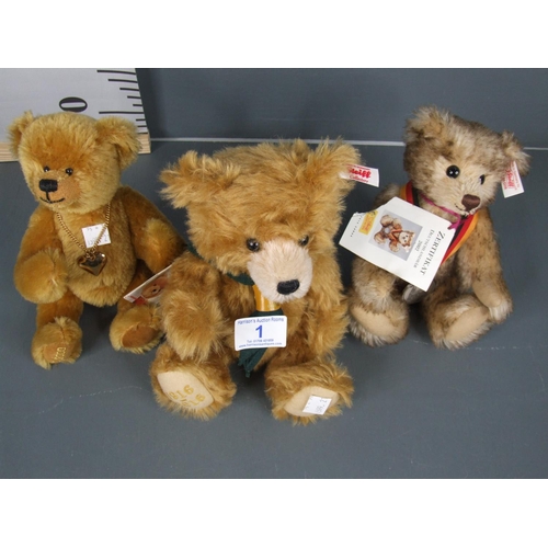 1 - 3 steiff teddy bears 
1 is 100 years cub scouts 1916-2016