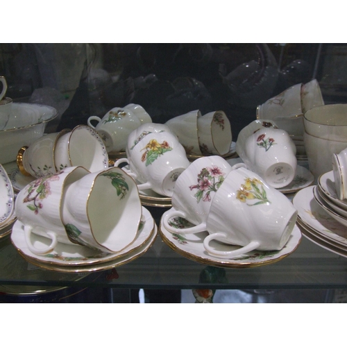 12 - 4 China tea sets (1 set missing one cup)