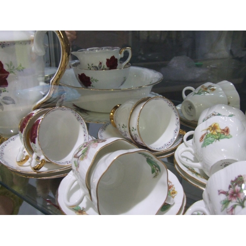 12 - 4 China tea sets (1 set missing one cup)