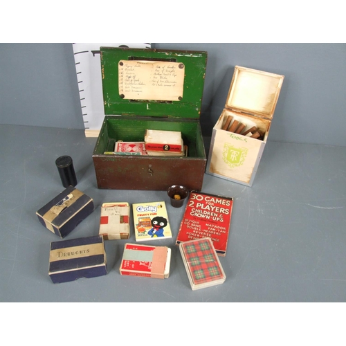 138 - Vintage wooden box of games + ringtons tea box with wood carving tools