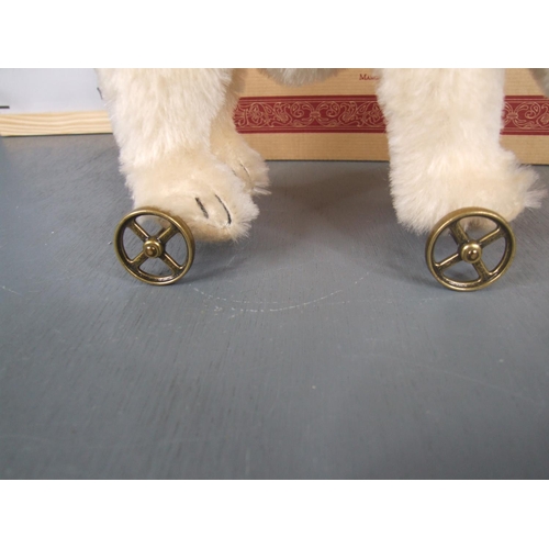 14 - Steiff Polar bear on brass wheels. Advertised on eBay for £500