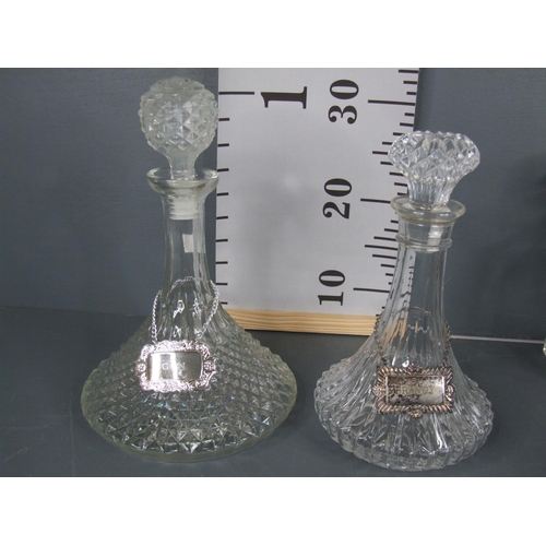 20 - 7 Glass decanters with labels