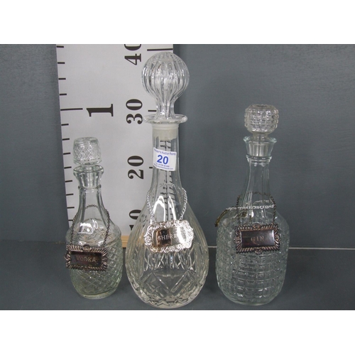 20 - 7 Glass decanters with labels