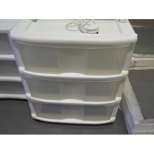 245 - 3 White sets of plastic drawers + 2 heaters